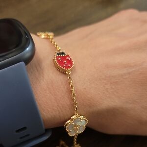 VC&A Gold Toned Women's Bracelet with Red LadyBug and White Clover Charms
